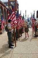 Shirley passes out hats to the Flag Corps