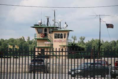 River Barge Tug Boats Tied Up At River Front