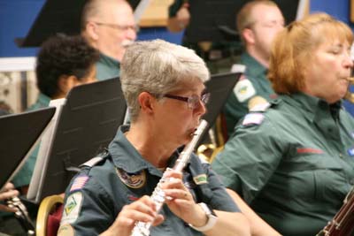 Here Is Adair Playing The Flute In The Concert